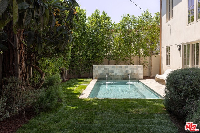 Building Photo - 4228 Los Nietos Dr