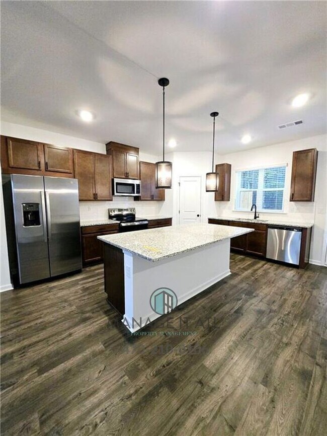Building Photo - Beautiful End-Unit three-story townhome in Tucker