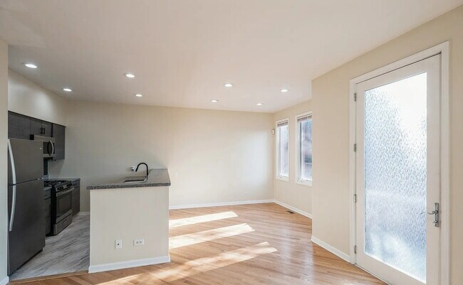 Building Photo - Upscale Living at Its Finest