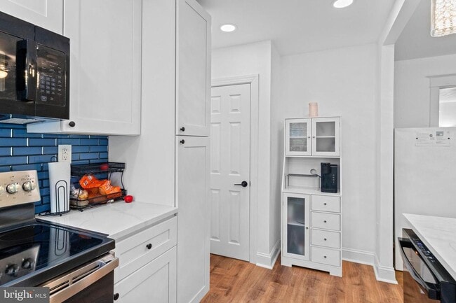 Building Photo - Welcome to this sunny and updated 4-bedroom, 2-bath row home in the heart of Mt. Airy! W/D! Large...