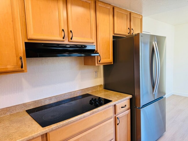 Building Photo - Tastefully updated 2 bedroom/2 bath, single level townhome w/attached 2 car garage!