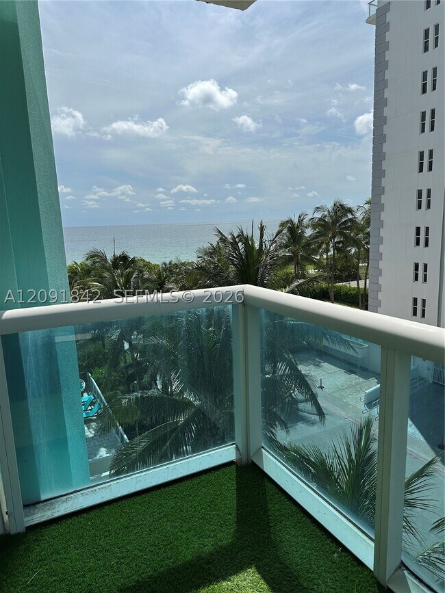 Building Photo - 9201 Collins Ave