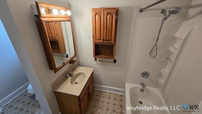 Building Photo - Charming 3BR Home in Norwood with Fenced Yard, Detached Garage & Workshop – Prime Location!