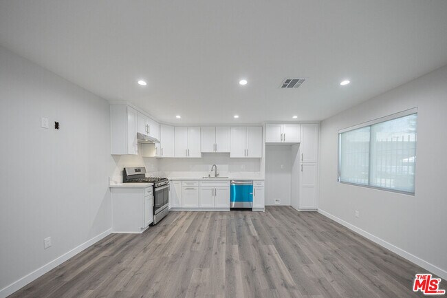 Building Photo - 5837 Cartwright Ave