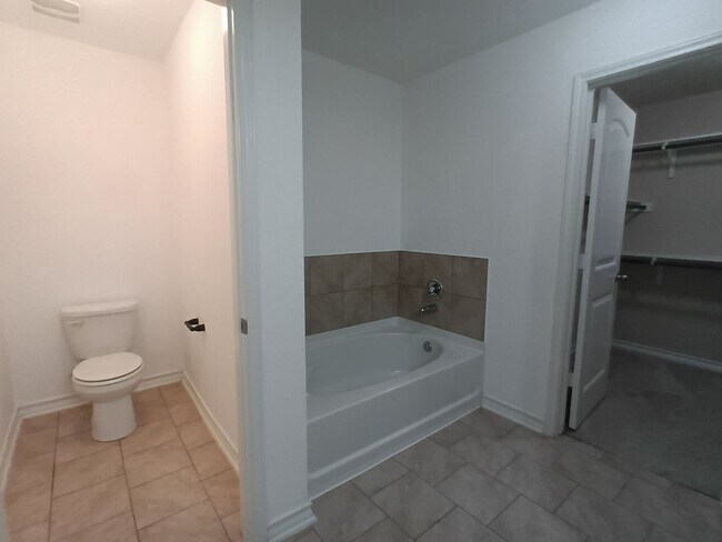 Building Photo - Spacious 4-Bedroom Home with Washer & Dryer Included in Riposa Vita Community!
