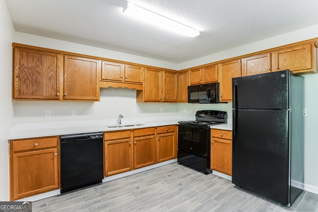 Building Photo - 719 Woodwind Dr