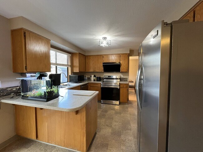 Building Photo - Light-Filled Three Bedroom Home with Private Bonus Space and Outdoor Living