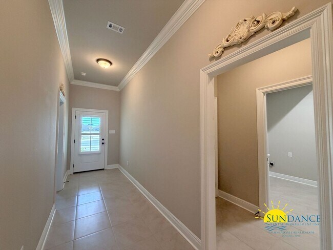 Building Photo - Custom-crafted details shine throughout this stunning 3-bedroom home in Magnolia at the Bluffs in...