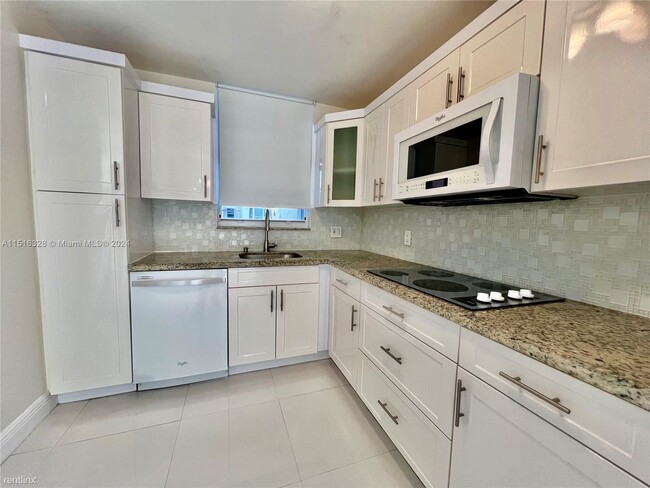 Building Photo - 3 br, 2.5 bath Condo - 8625 SW 152nd Ave A...