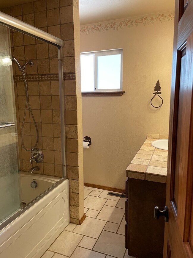 Building Photo - Tranquil and Upgraded Home Situated on a L...