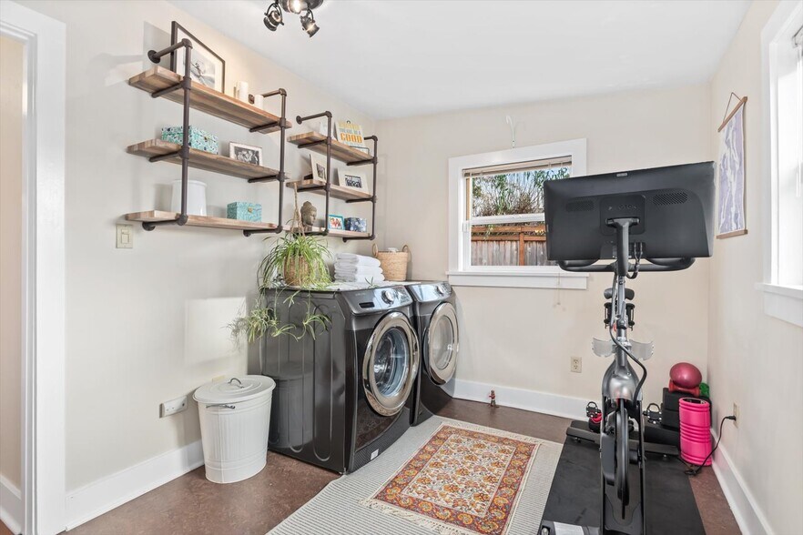 Bonus room with laundry and room for home gym or office - 8042 Earl Ave NW