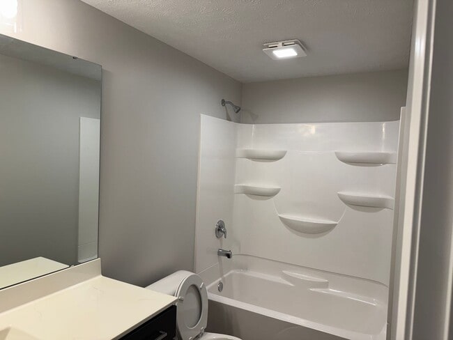 Building Photo - New Construction! West side location. 4br, 3bth, 2crg, Finished basement. All new stainless steel...