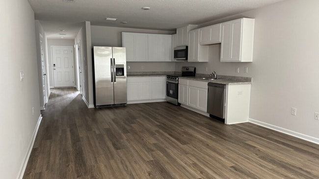 Building Photo - 6317 Firefly Dr