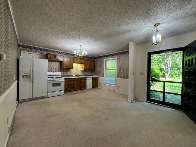 Building Photo - Beautiful Duplex Located in Serene, Wooded...