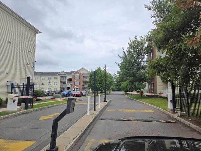 Building Photo - Gated community, 2nd fl condominium with 3...