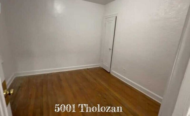 Building Photo - 5001 Tholozan Ave