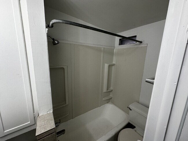 Building Photo - "Charming 1-Bed Oasis in Denver's Heart – Cozy Comforts!"