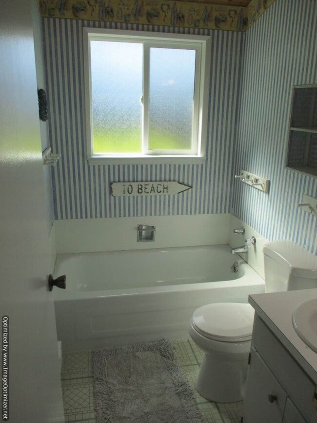 Building Photo - Charming Partially Furnished Waterfront Ho...