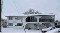 Building Photo - B.C. Tri-Plex River Rd