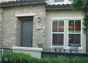 Front door with patio area for sitting and barbecue. - 6395 Delgado Ln