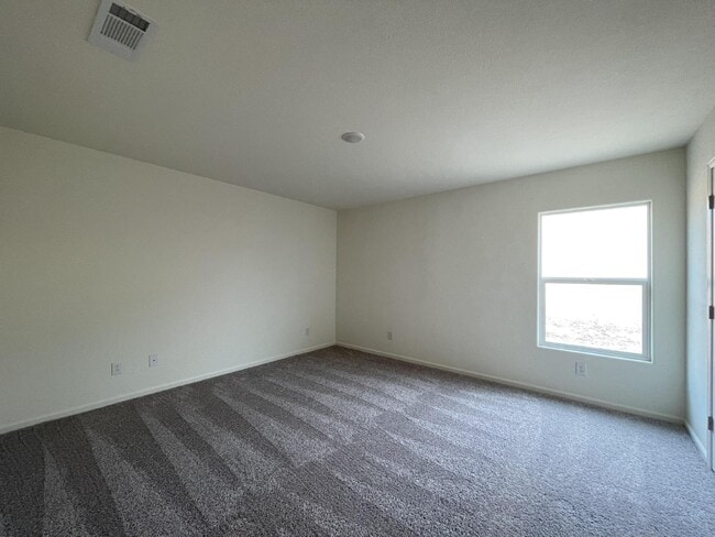Building Photo - $1,675 rent - Home in gated community with...