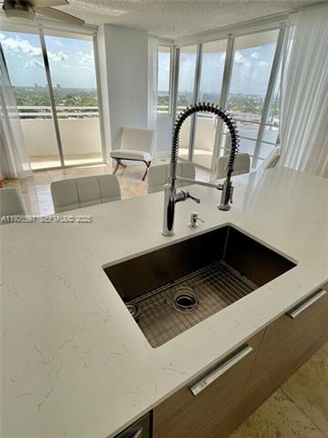 Building Photo - 8911 Collins Ave