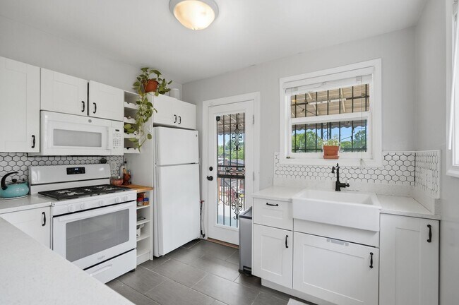 Building Photo - Michigan Park Townhome | 4 Bed | 2.5 Bath | 1,700 Sf | Fenced-in Front & Backyard w/ Deck