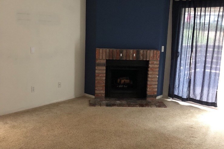 Fireplace in living room - 1730 S El Camino Real
