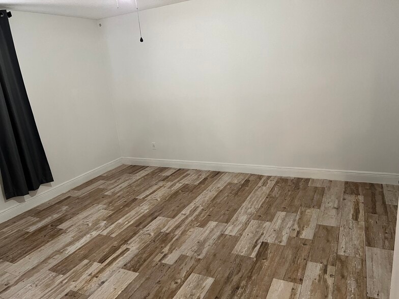 1st bedroom with tile floor - 2130 Forest Knoll Dr NE