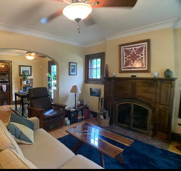 living room with custom fireplace - 3604 Oakdale Ave N