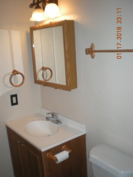 Upstairs full bathroom with wood accents - 1160 Clinton St