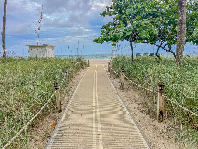 Building Photo - 9801 Collins Ave