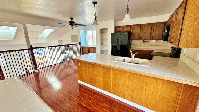 Building Photo - Large Deck & Fenced Backyard in this Lovely 3 Bed 2 Bath 2 Garage Home in Stone Ridge Park!!