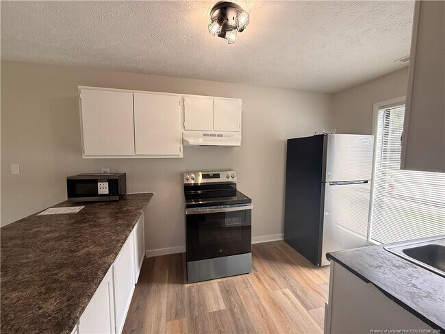 Building Photo - 1422 Tangora Ln