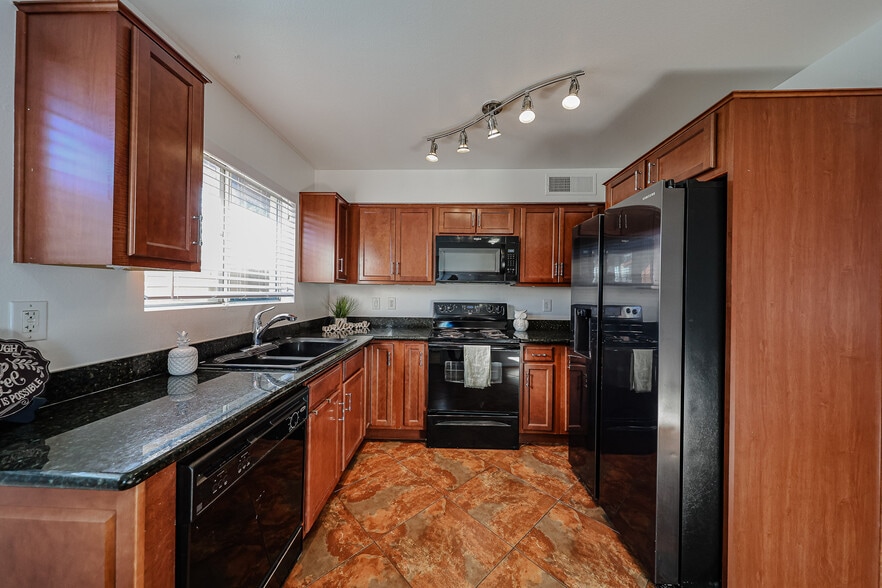 Nicely updated kitchen with brand new black stainless fridge & ice maker - 3022 N 37th St