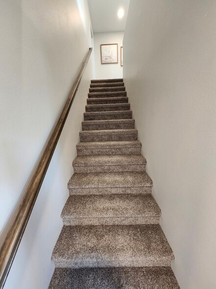 Stairs off the main entrance hallway leading to the upstairs - 5310 Welder Ave