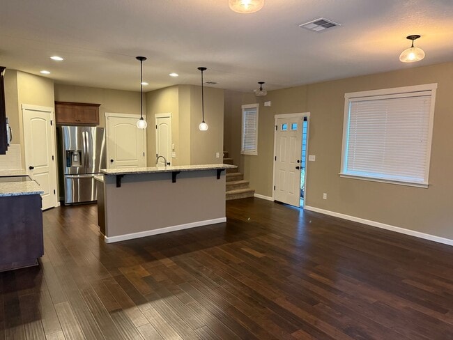 Building Photo - Beautiful 3 Bedroom House with High Ceilings, 2 Car Garage, Great Location & More!