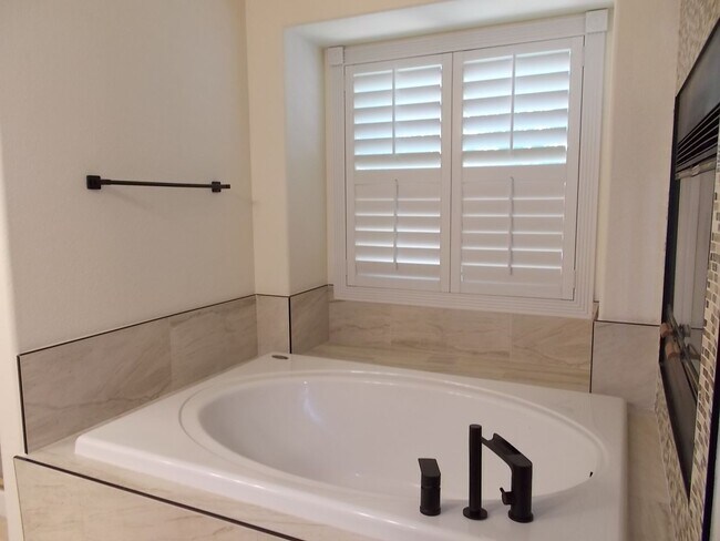 Building Photo - Charming Home in Gated Melrose Park Estates with Dual Fireplaces & Covered Patio