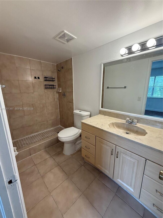 Building Photo - 11120 Royal Palm Blvd