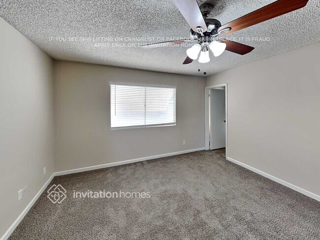 Building Photo - 9023 W Harmont Dr