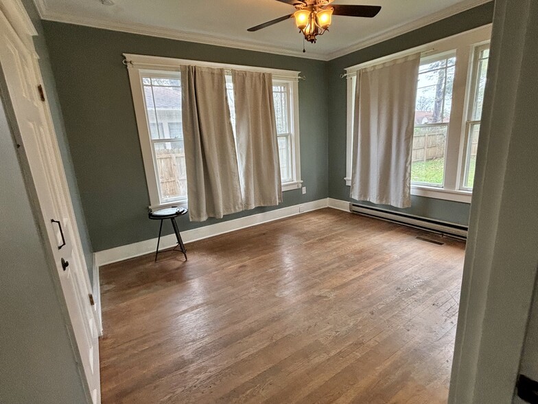 Primary/Main Bedroom with ensuite, comes with queen bed frame/bed, carpet, 2 side tables - 1939 Nelson Ave