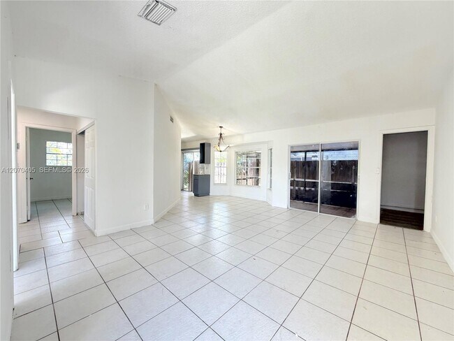 Building Photo - 9850 W Heather Ln