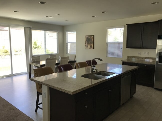 Building Photo - Private large 4 bed NextGen, with double living rooms, kitchens and laundries.