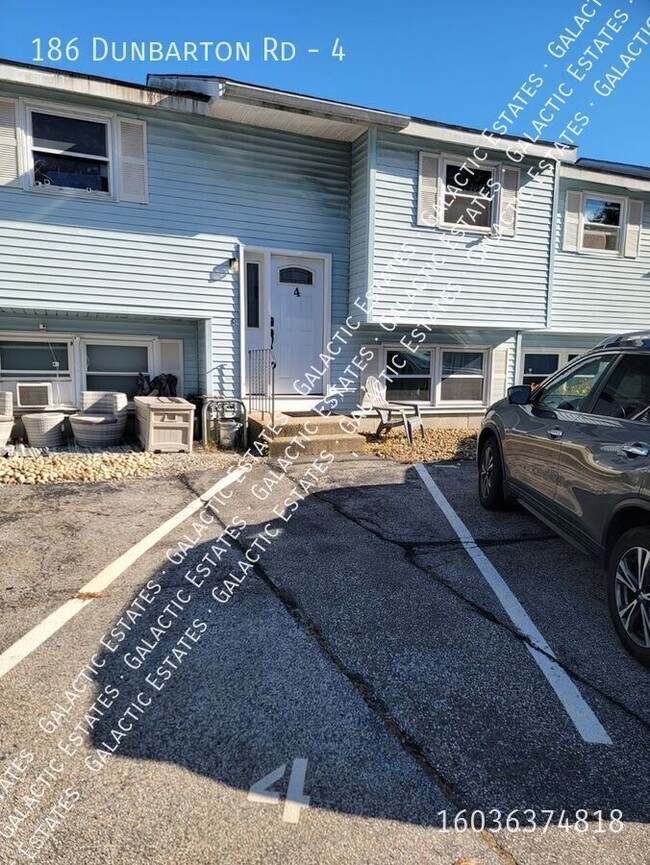 Building Photo - 2 bed 1 bath townhouse with under garage p...