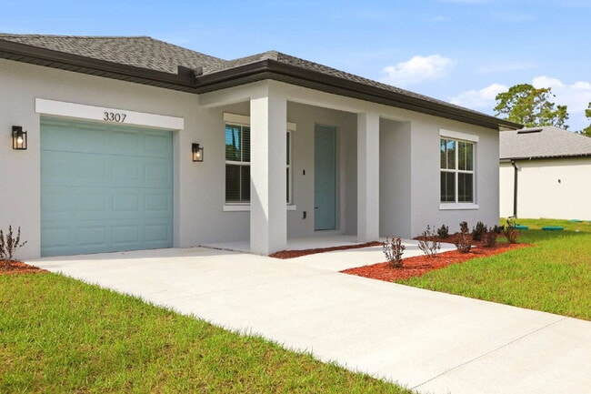 Building Photo - Brand New 4-Bedroom Gem with 2 Full Baths on Large Lot in Lehigh Acres – A Perfect Family Haven!