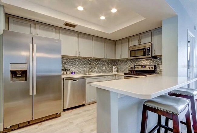 Building Photo - LONG TERM - FULLY FURNISHED 2/2 Open water...