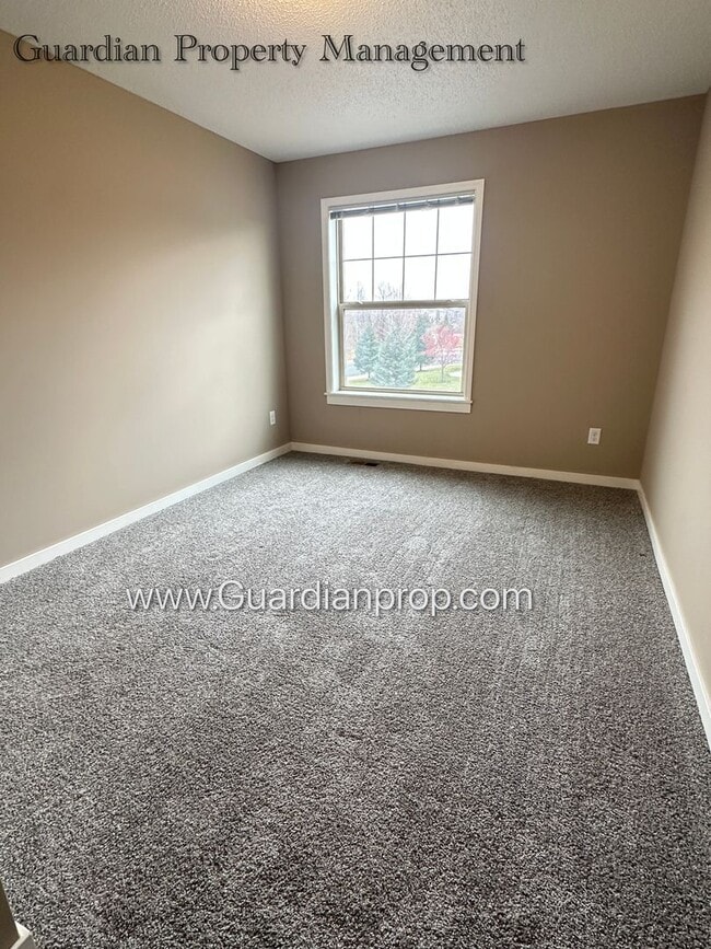 Building Photo - North Brooklyn Park Town Homes, Dedicated Office, 2 Car Garage, Washer/Dryer, Front Patio