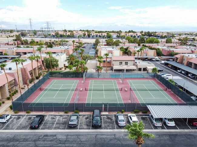 Building Photo - Guard gated SW community with easy Strip a...