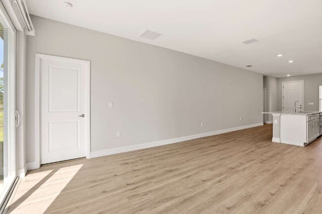 Building Photo - Brand New 4-Bedroom Gem with 2 Full Baths on Large Lot in Lehigh Acres – A Perfect Family Haven!