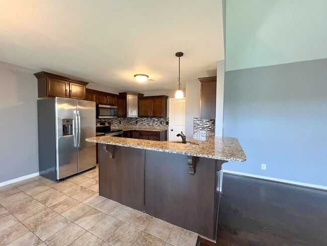 Building Photo - Gorgeous Single-Family--Fenced Backyard and Bonus Room!